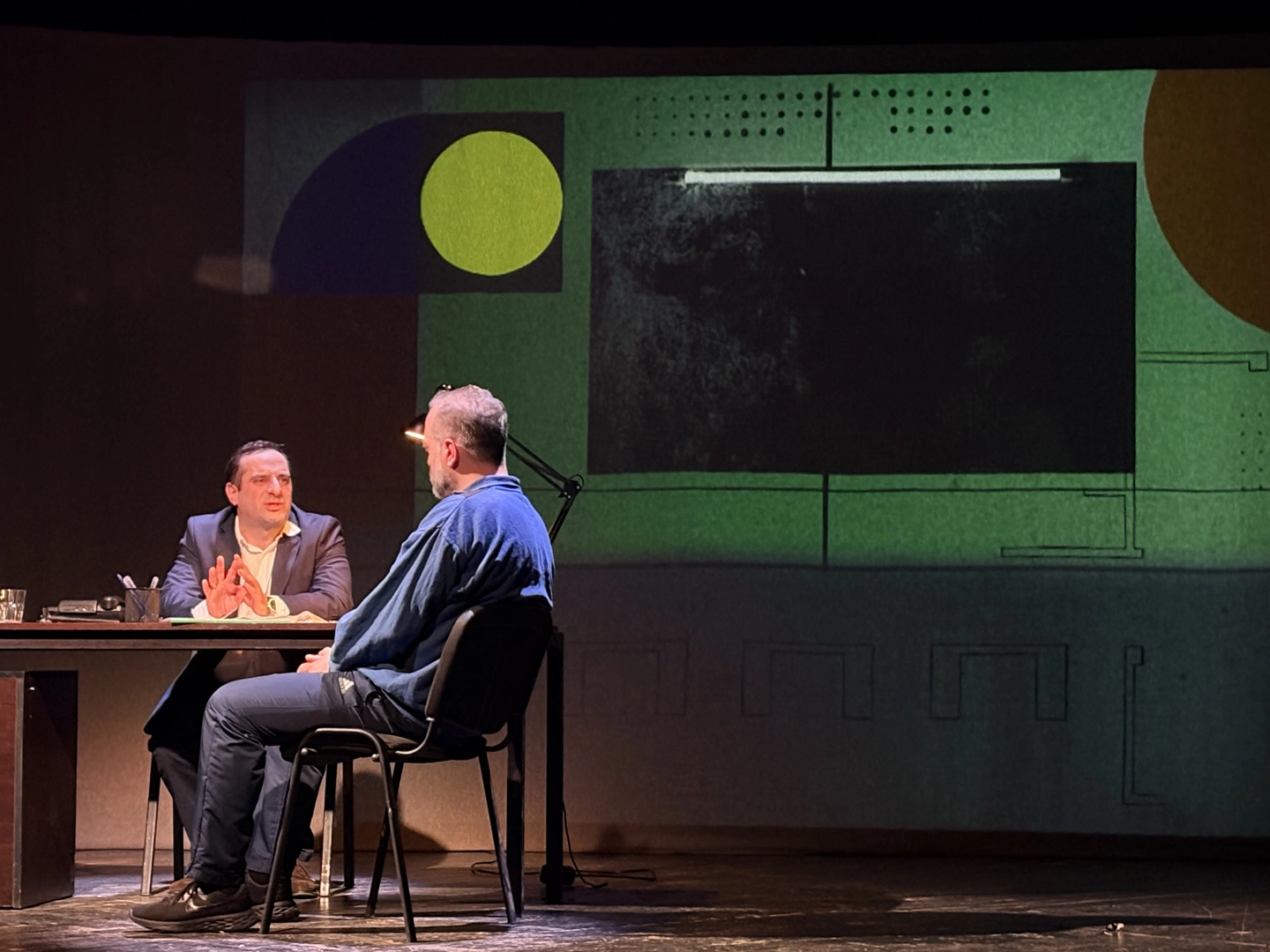 Interrogation scene from the play Game Theory featuring Iraki Chkhikvadze and Vaniko Tarkhnishvili at City Theatre