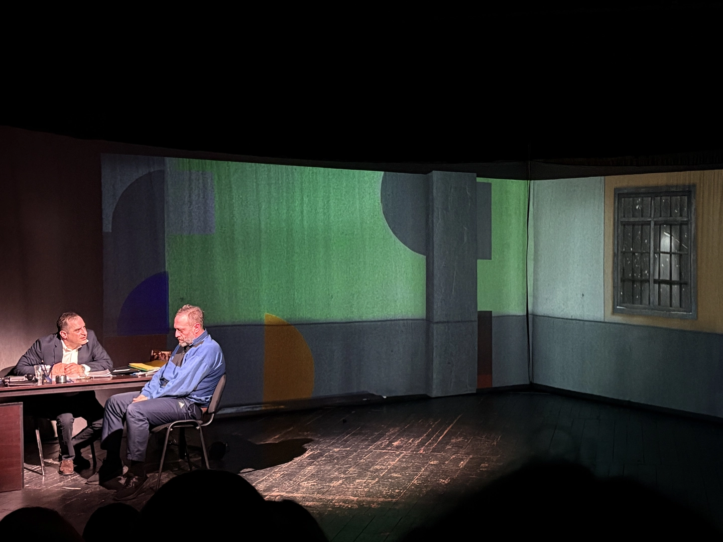 Visual projection on the stage curtain during the play Game Theory at City Theatre